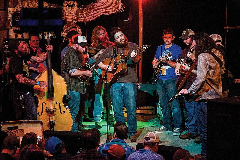 A jam session followed a previous Ozark Mountain Music Festival at Chelsea’s in downtown Eureka Springs. Pictured are members of The Damn Neighbors, Grass Fed and Elijiah Benson.

(Courtesy Photo)