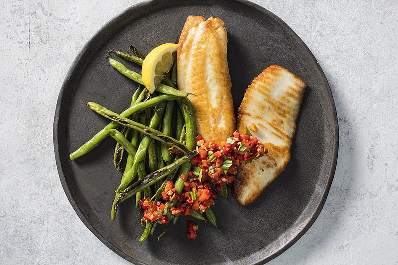 Pan-Seared Tilapia With Blistered Green Beans and Red Pepper Relish
Courtesy of America’s Test Kitchen