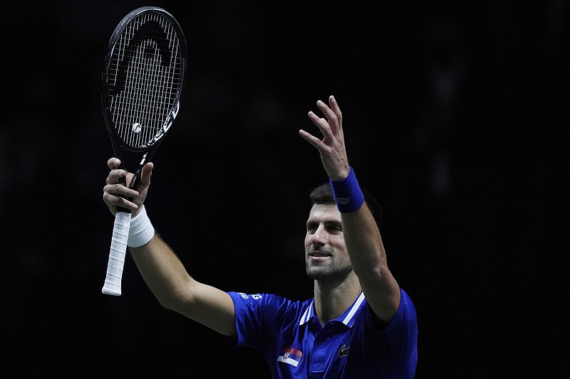 FILE - Serbia's Novak Djokovic after defeating Croatia's Marin Cilic during their Davis Cup tennis semi-final match at Madrid Arena in Madrid, Spain, on Dec. 3, 2021. Top-ranked Novak Djokovic has withdrawn from the ATP Cup in Australia ahead of the first Grand Slam of the season. Cup organizers didn't give a reason. The 34-year-old Serbian has declined to comment on his vaccination status in recent months and Australia&#x2019;s strict regulations require all players, officials and fans to be fully vaccinated for COVID-19. (AP Photo/Bernat Armangue)