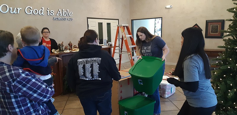 The volunteers of Richmond Road Baptist Church, put away the Christmas decorations for another year on Saturday. According to the volunteers, they typically do it the first week after New Year's Day. Among those helping: Tony Henry, Ali Purifoy, Jenny Henderson, Peri Seward, Barbara Sisk and Jack “Just Jack ” Purifoy, Ali’s son. (Staff photo by Junius Stone)