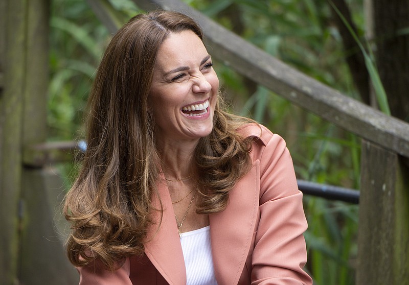 FILE - Britain's Kate, the Duchess of Cambridge visits the Urban Nature Project at the Natural History Museum, in London, June 22, 2021. The Duchess of Cambridge, who turns 40 on Sunday Jan. 9, 2022, has emerged as Britain&#x2019;s reliable royal. After Prince Harry and Meghan&#x2019;s stormy departure to California in 2020, the death of Prince Philip last year, and now sex abuse allegations against Prince Andrew, the former Kate Middleton remains in the public eye as the smiling mother of three who can comfort grieving parents at a children's hospice or wow the nation by playing piano during a televised Christmas concert. (Geoff Pugh/Pool Photo via AP, File)