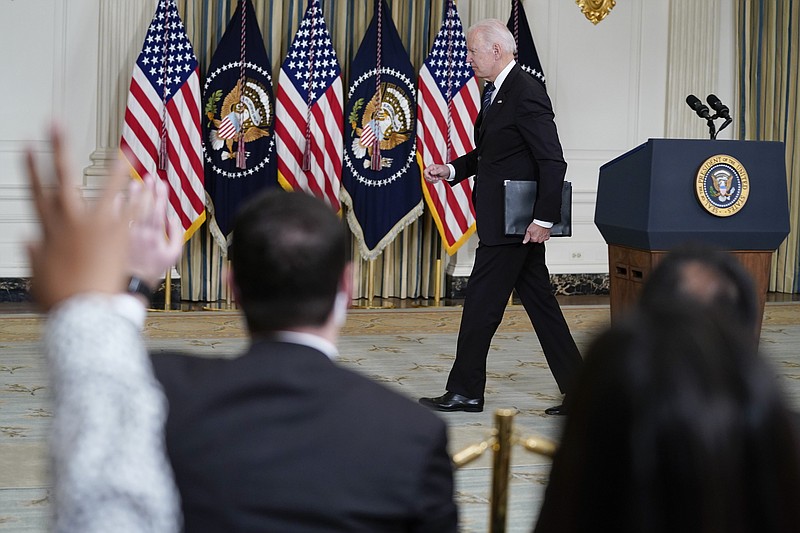 FILE - President Joe Biden departs after speaking about the October jobs report from the State Dining Room of the White House, Nov. 5, 2021, in Washington. As President Joe Biden wraps up his first year in the White House, he has held fewer news conferences than any of &#xa0;his five immediate predecessors at the same point in their presidencies, and has taken part in fewer media interviews than any of his recent predecessors. That's according to new research from Towson University professor emerita Martha Joynt Kumar. (AP Photo/Evan Vucci, File)