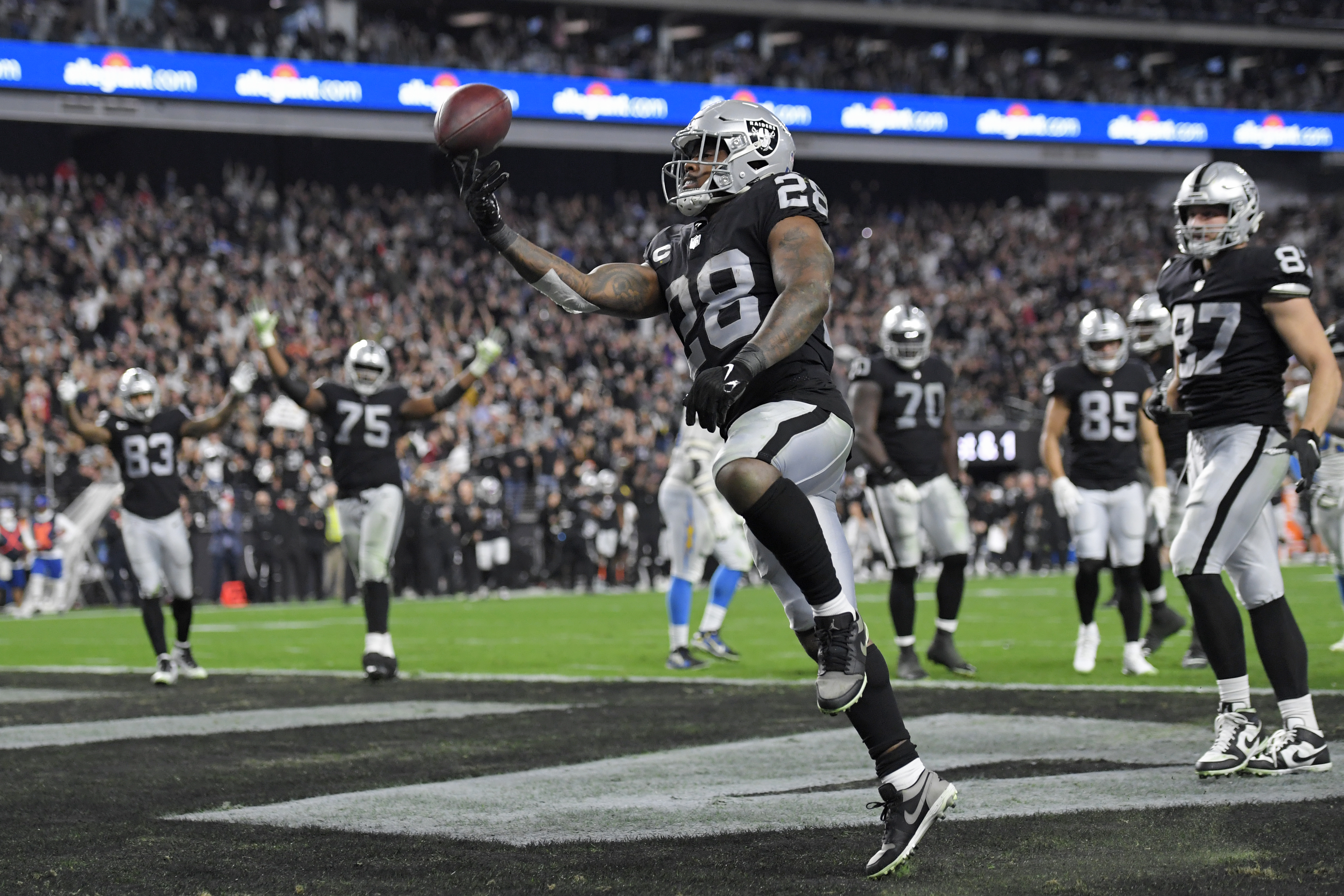 Las Vegas Raiders free safety Trevon Moehrig (25) takes down