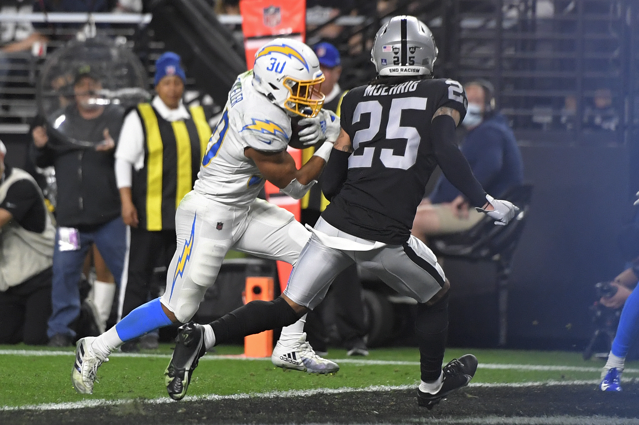 Las Vegas Raiders free safety Trevon Moehrig (25) takes down