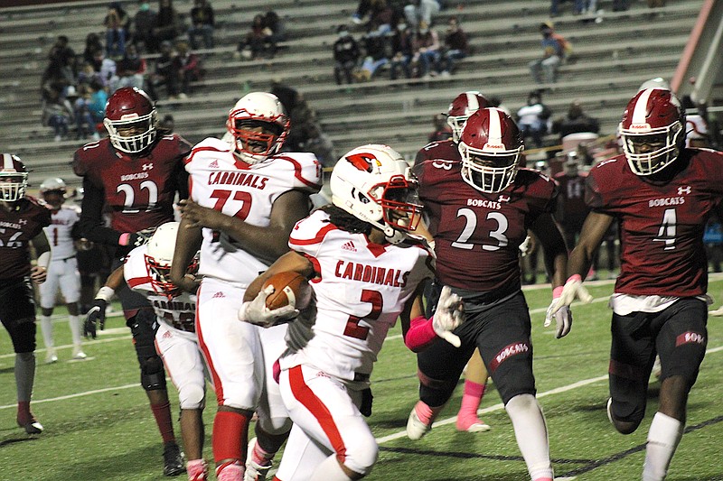 Photo By: Michael Hanich
Camden Fairview wide receiver Brandon Copeland runs for the touchdown after making the reception in the game against the Hope Bobcats.