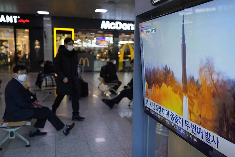 A TV shows a file image of North Korea's missile launch during a news program at the Seoul Railway Station in Seoul, South Korea, Tuesday, Jan. 11, 2022. North Korea on Tuesday fired what appeared to be a ballistic missile into its eastern sea, its second weapons launch in a week, the militaries of South Korea and Japan said. The Korean letters read &quot;North Korea launches the second time this year.&quot; (AP Photo/Ahn Young-joon)