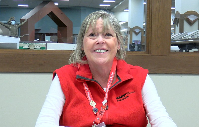 Debbie Brown, AARP Foundation Tax-Aide state and local coordinator, is interviewed recently at the Garland County Library. - Photo by Donald Cross of The Sentinel-Record