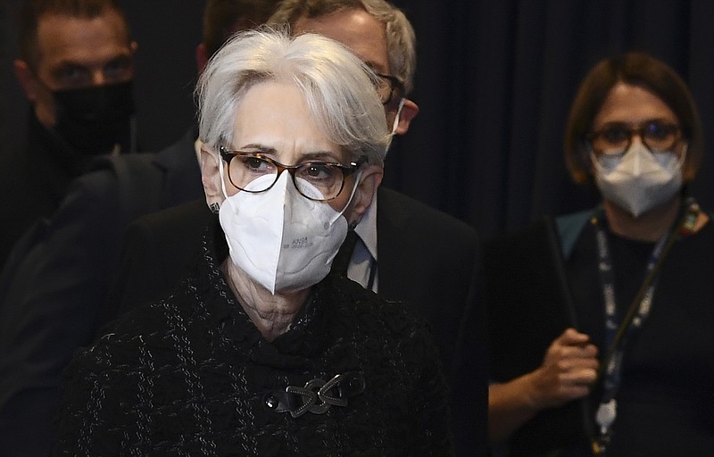 United States Deputy Secretary of State Wendy Sherman, center, arrives with her delegation for a meeting of the Political and Security Committee at the European Council building in Brussels, Tuesday, Jan. 11, 2022. (John Thys, Pool Photo via AP)