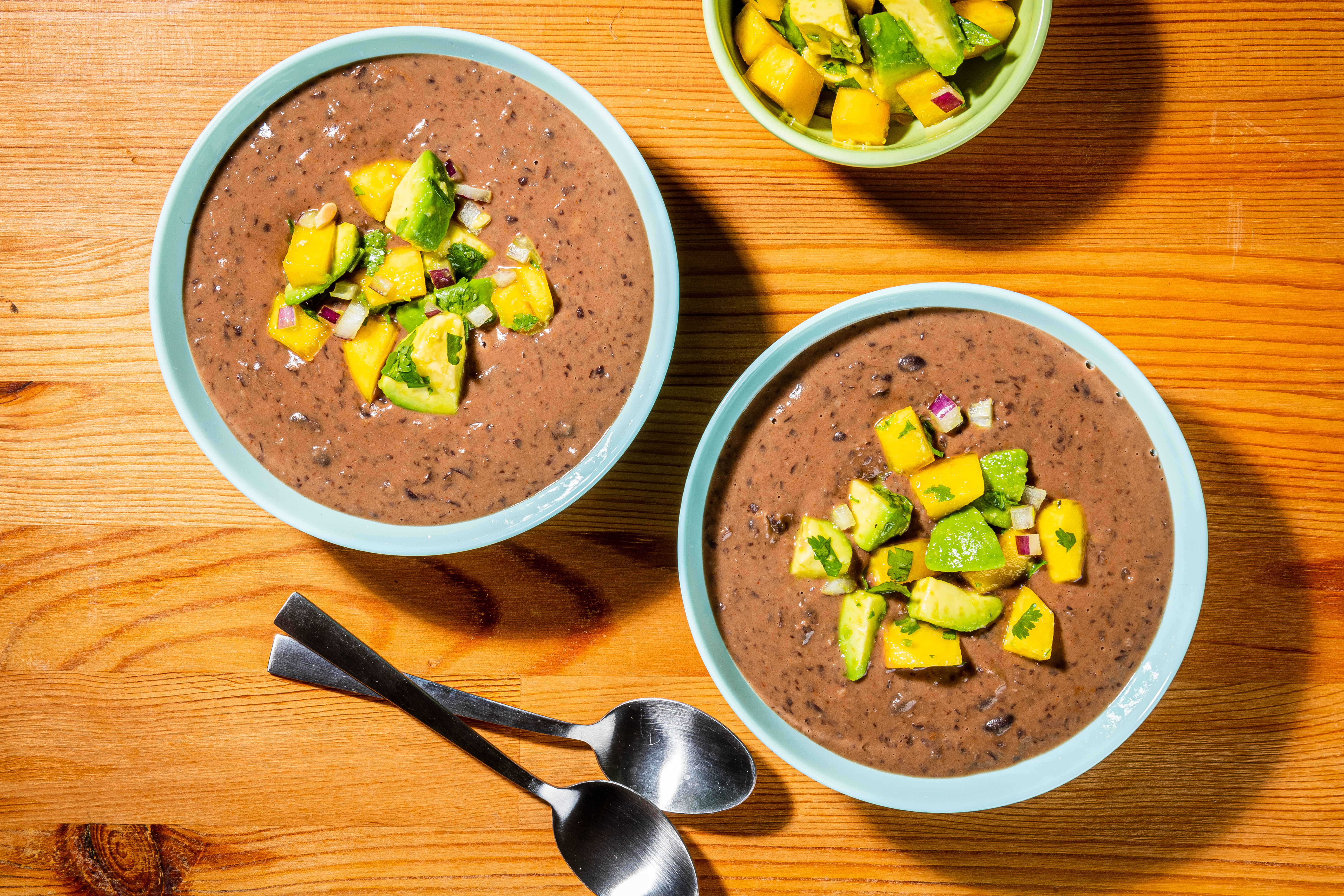 Coconut black bean soup with mango-avocado salsa is creamy, bright and satisfying - Vimarsana News