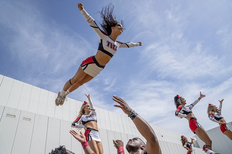 This image released by Netflix shows Trinity Valley Community College cheerleader Maddie Volcik in a scene from &quot;Cheer.&quot; (Netflix via AP)