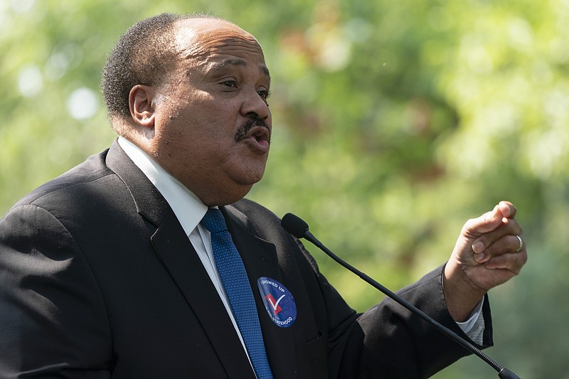 FILE - Martin Luther King III speaks during a rally for voting rights, Tuesday, Sept. 14, 2021, on Capitol Hill in Washington. As communities across the nation prepare to mark the birthday of the Rev. Martin Luther King, Jr., some members of his family are spending it in conservative-leaning Arizona to mobilize support for languishing federal voting rights legislation. Martin Luther King III, his wife and their 13-year-old daughter will take part Saturday, Jan. 15, 2022 in an on-the-ground campaign for voting rights in Phoenix.(AP Photo/Jacquelyn Martin, File)