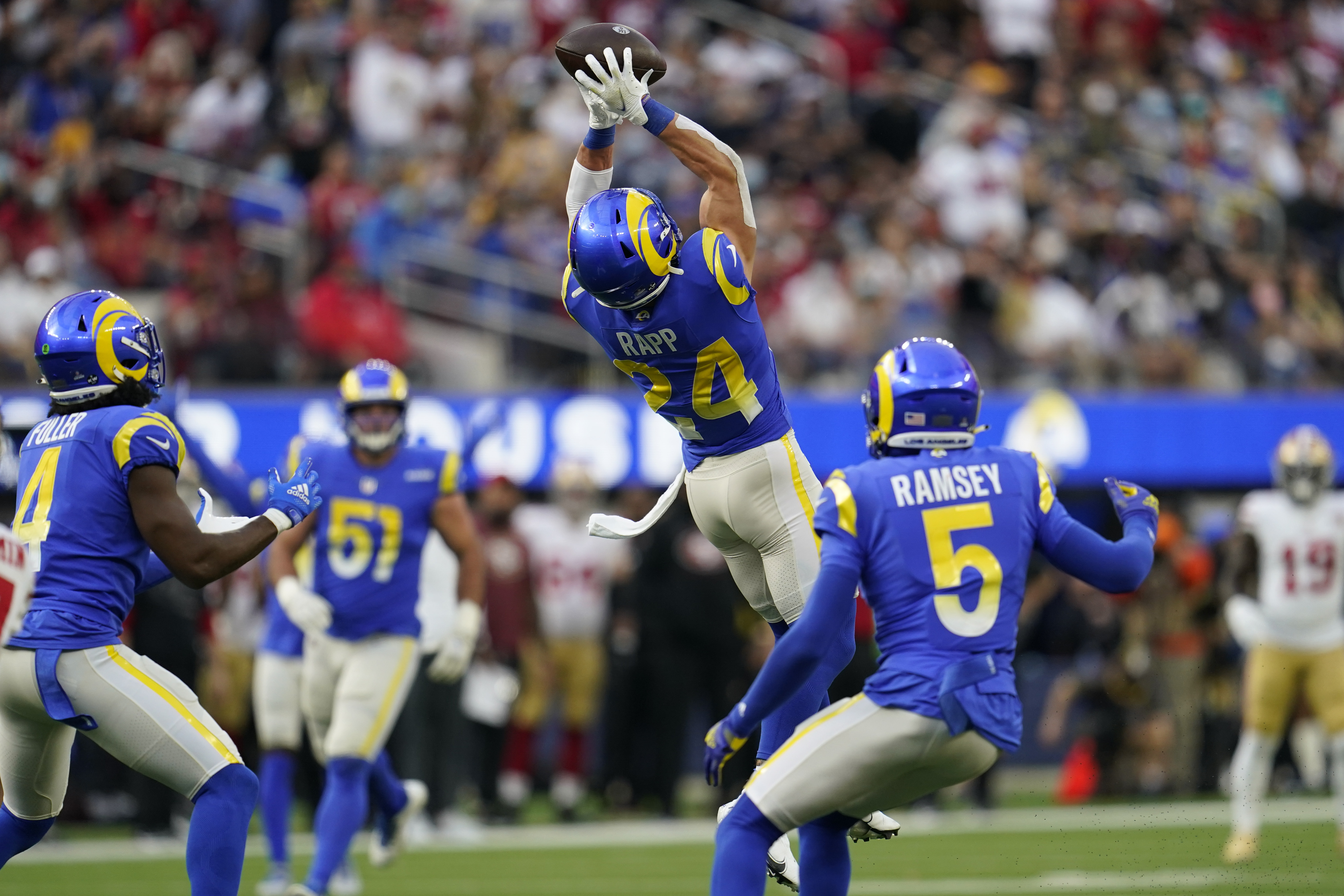 Los Angeles Rams cornerback Jalen Ramsey (5) intercepts a pass