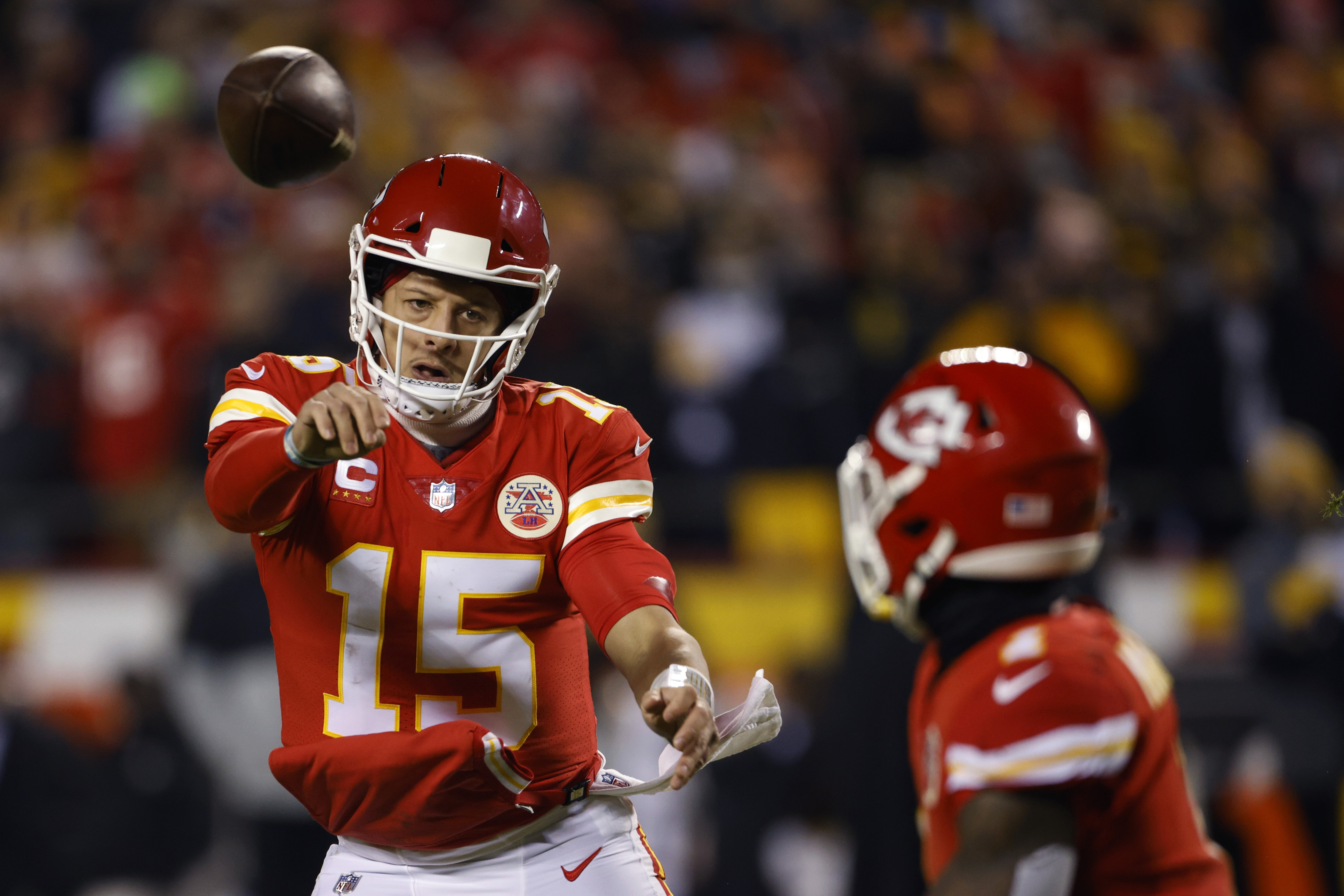 Kansas City Chiefs quarterback Patrick Mahomes (15) celebrates after  throwing a touchdown pass during the first half of an NFL divisional round  playoff football game against the Buffalo Bills, Sunday, Jan. 23