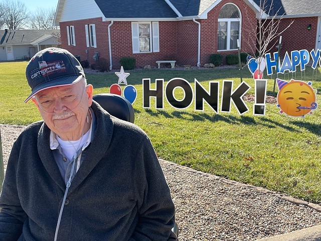 Democrat photo/Kaden Quinn
California resident Jerry Coale stands outside his home to enjoy his family's special surprise for his 85th birthday.