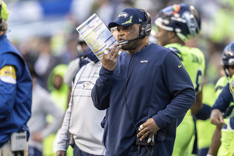 FILE - Seattle Seahawks defensive coordinator Ken Norton Jr. watches from the sideline during the first half of an NFL football game against the Los Angeles Rams, Thursday, Oct. 7, 2021, in Seattle. The Seattle Seahawks have fired defensive coordinator Ken Norton Jr. and passing game coordinator Andre Curtis, the team said Tuesday., Jan. 18,  2022 (AP Photo/Stephen Brashear, File)