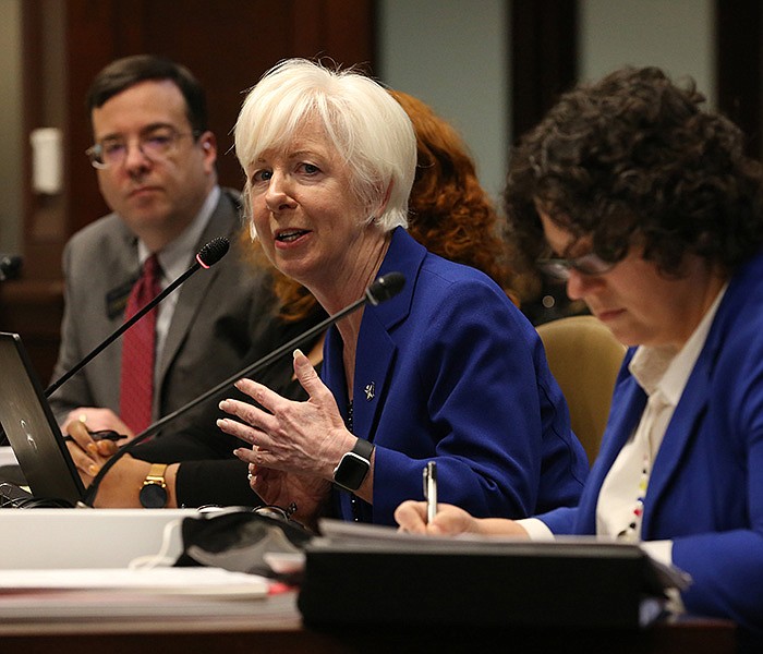 Cindy Gillespie (center), Secretary of the Arkansas Department of Human Services, answers questions during the Joint Budget Committee's Pre-Fiscal Session Budget Hearings on Wednesday, Jan. 19, 2022, at the state Capitol in Little Rock. 
(Arkansas Democrat-Gazette/Thomas Metthe)