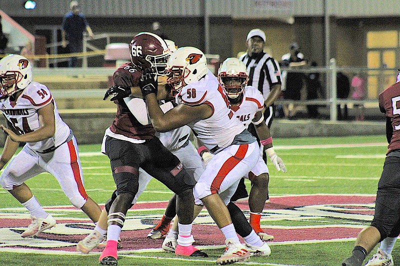 Photo By: Michael Hanich
Camden Fairview guard/tackle Timothy Dawn Jr. setting up a run block in the game against Hope.