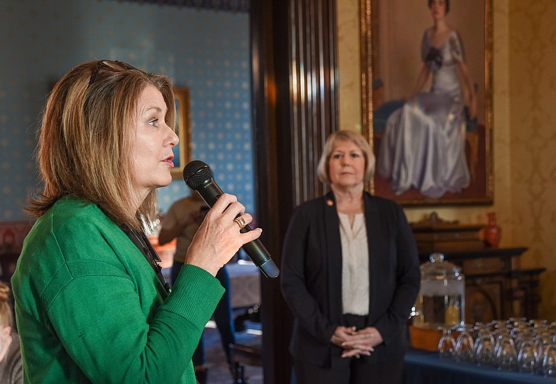 Julie Smith/News Tribune
Lee Knernschield, executive director of Big Brother Big Sisters welcomes visitors to the Missouri Governor's Mansion as First Lady Teresa Parson, seen in background, and Second Lady Claudia Kehoe hosted an event for local mentors or bigs from BBBB Thursday morning. January is Mentoring Month and to encourage the activity, the first and second ladies recorded a public service announcement encouraging state workers to avail themselves of the paid, one-hour-a-week chance to mentor students.