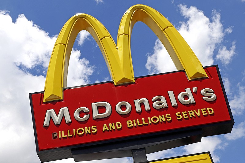 FILE - This June 25, 2019, photo shows the sign outside a McDonald's restaurant in Pittsburgh.  McDonald&#x2019;s is expanding U.S. testing of its meatless McPlant burger. The company said the McPlant __ which it's developing with plant-based protein company Beyond Meat __ will be tested at 600 stores in the San Francisco and Dallas areas starting Feb. 14, 2022.   (AP Photo/Gene J. Puskar, File)