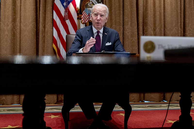 The Associated Press
President Joe Biden meets with members of the Infrastructure Implementation Task Force to discuss the Bipartisan Infrastructure Law, in the Cabinet Room at the White House in Washington on Thursday.