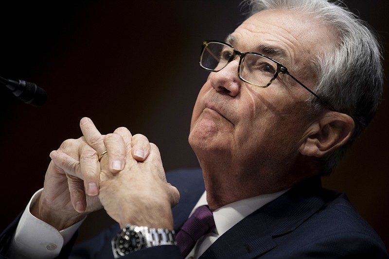 Federal Reserve Board Chairman Jerome Powell listens during his re-nominations hearing before the Senate Banking, Housing and Urban Affairs Committee, Tuesday, Jan. 11, 2022, on Capitol Hill in Washington.  (Brendan Smialowski/Pool via AP)