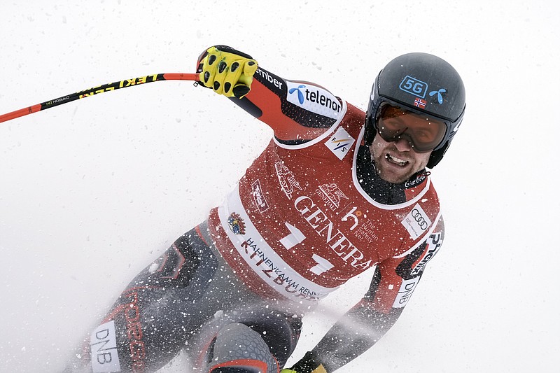 Norway's Aleksander Aamodt Kilde celebrates as he gets to the finish area after completing an alpine ski, men's World Cup downhill, in Kitzbuehel, Austria, Friday, Jan. 21, 2022. (AP Photo/Giovanni Auletta)