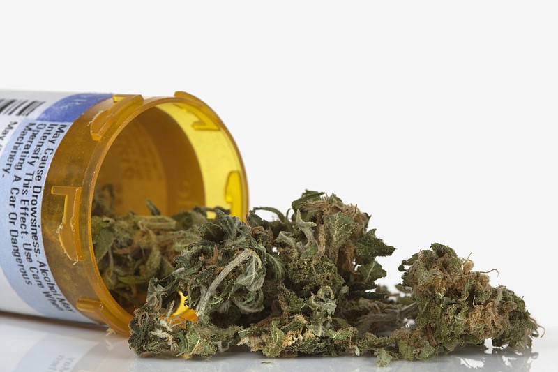 an opened container of medical marijuana. Metro Creative Graphics