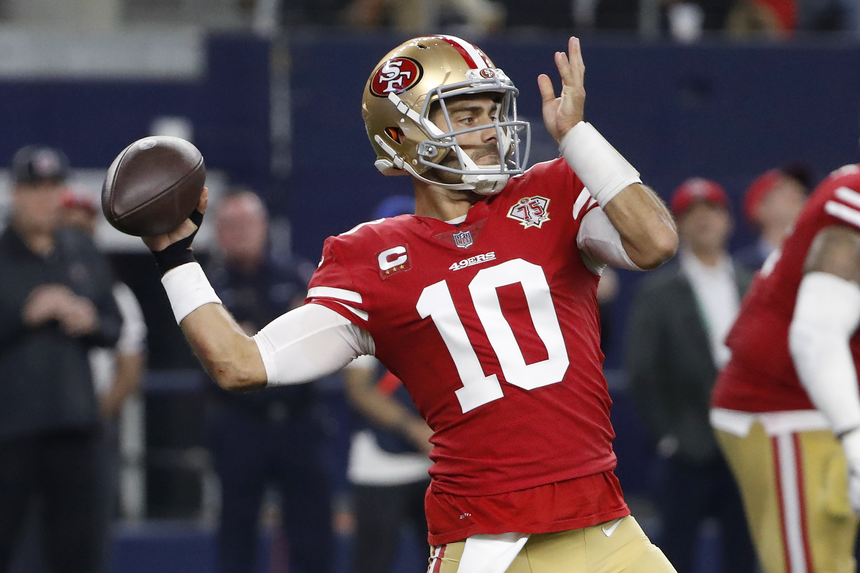 San Francisco 49ers quarterback Jimmy Garoppolo (10) is seen on the  sidelines during a wild card NFL football game against the Dallas Cowboys,  Sunday, Jan. 16, 2022, in Arlington, Texas. San Francisco