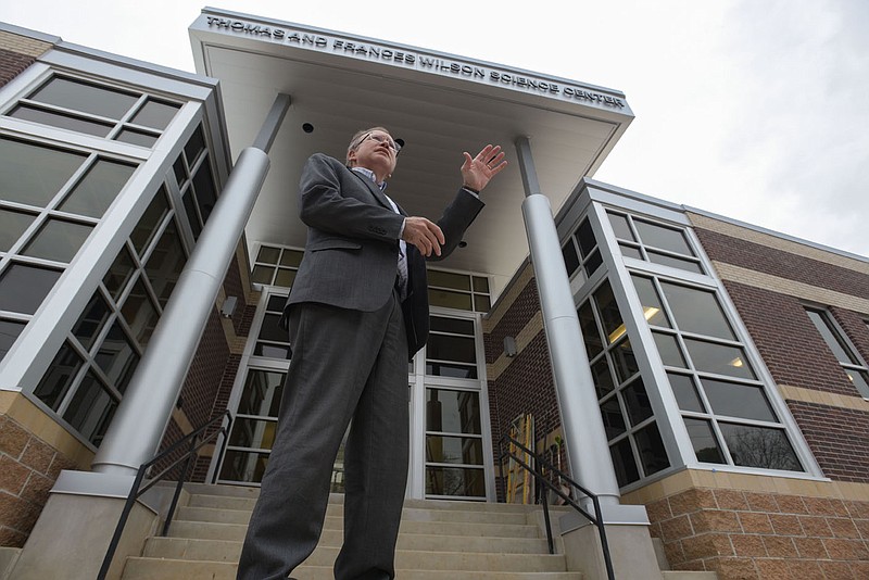 Rich Dunsworth, president of the University of the Ozarks, waves to a passing car on Thursday, Jan. 27, 2022, outside the new Thomas and Frances Wilson Science Center on the campus in Clarksville. Go to nwaonline.com/220130Daily/ for today's photo gallery.
(NWA Democrat-Gazette/Hank Layton)