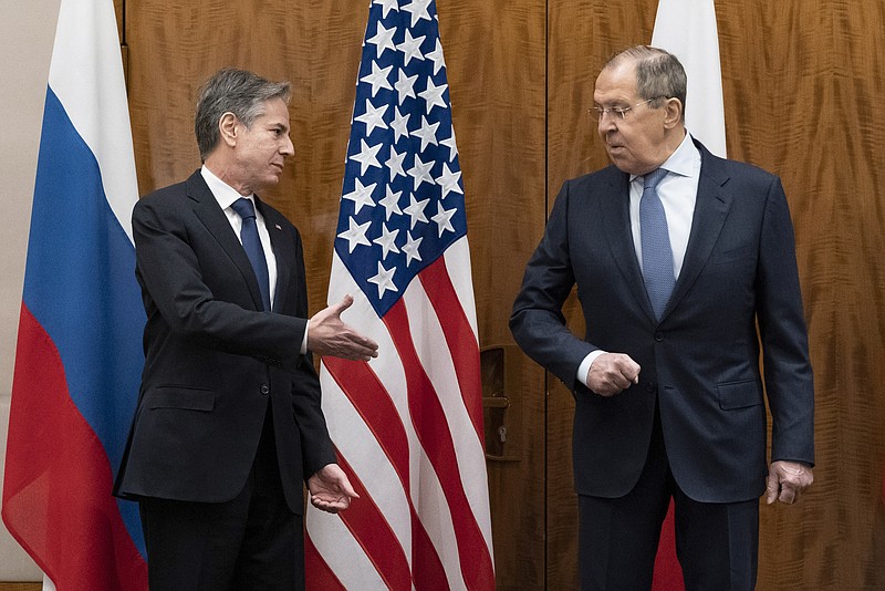 The Associated Press
US Secretary of State Antony Blinken, left, greets Russian Foreign Minister Sergey Lavrov before their meeting, in Geneva, Switzerland, on Friday.