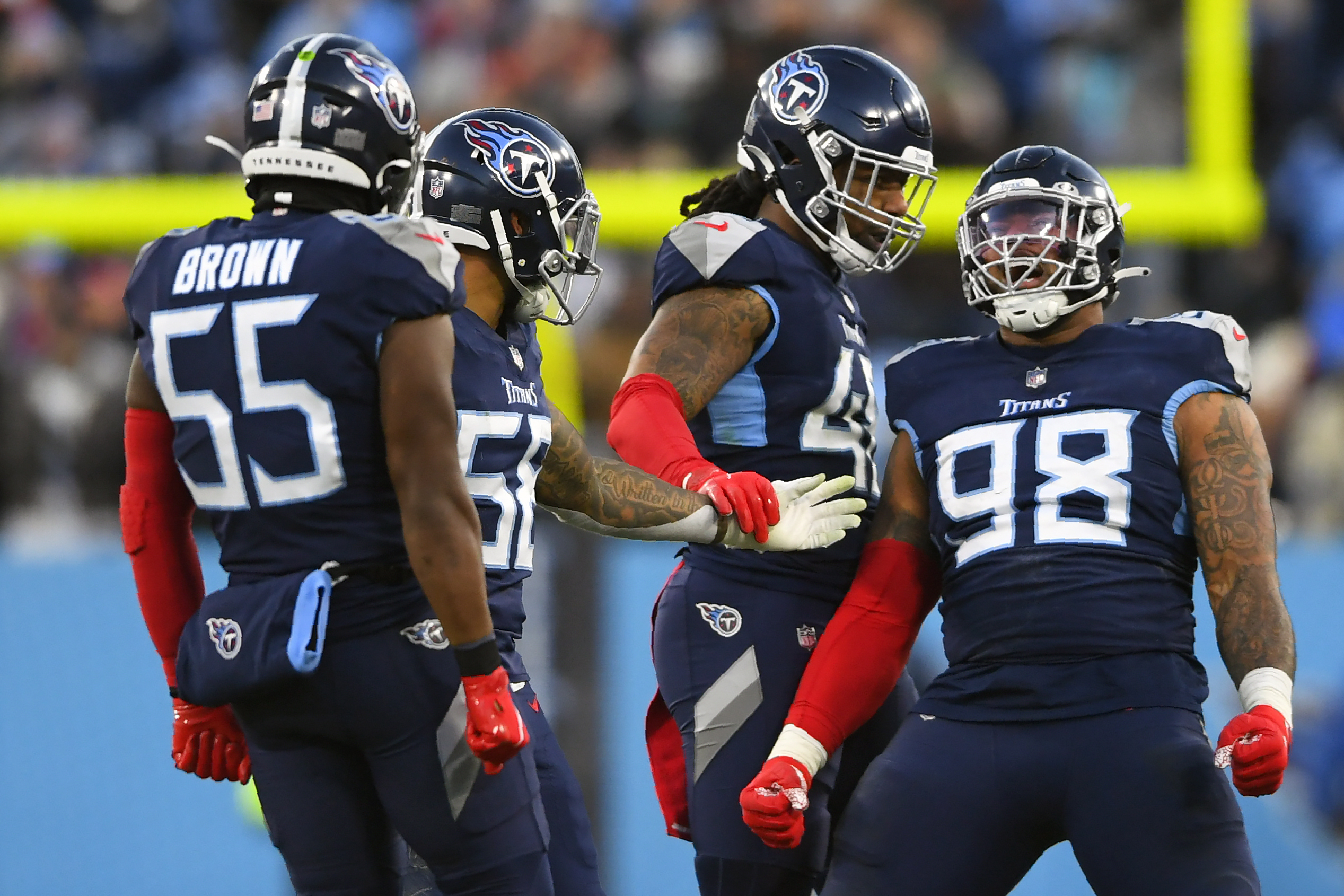 Tennessee Titans defensive tackle Naquan Jones (90) gets hurt and