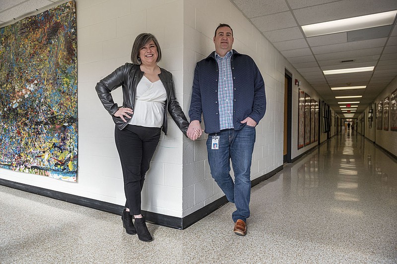 Although they don't see each other much at school, Nick and Leslie Lyons lead connected buildings on the same Bentonville campus, with Leslie serving as principal of Old High Middle School and Nicholas as principal of R.E. Baker Elementary School next door. (NWA Democrat-Gazette/Spencer Tirey)