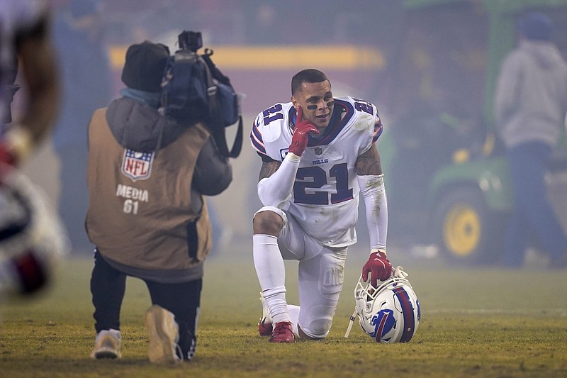 Buffalo Bills free safety Jordan Poyer (21) kneels on the field after a divisional round playoff game against the Kansas City Chiefs on Sunday in Kansas City, Mo. The Chiefs won 42-36 in overtime. - Photo by Ed Zurga of The Associated Press