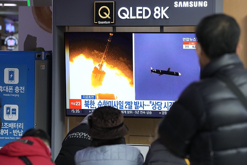 People watch a TV showing file images of North Korea's missile launch during a news program at the Seoul Railway Station in Seoul, South Korea, Tuesday, Jan. 25, 2022. North Korea on Tuesday test-fired two suspected cruise missiles in its fifth round of weapons launches this month, South Korean military officials said, as it displays its military might amid pandemic-related difficulties and a prolonged freeze in nuclear negotiations with the United States. The Korean letters read: &quot;North Korea fired two cruise missiles.&quot; (AP Photo/Ahn Young-joon)