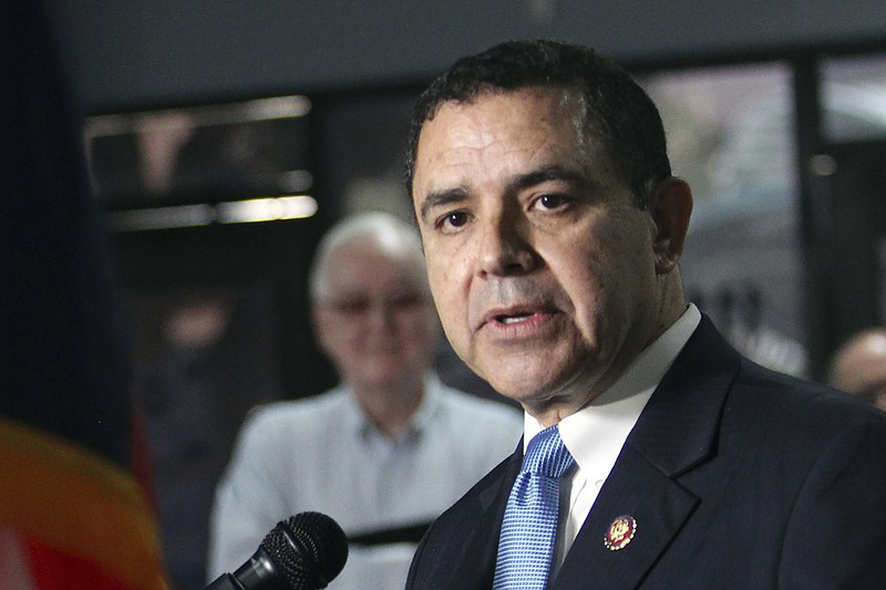 FILE - U.S. Rep. Henry Cuellar, D-Laredo, speaks during a press conference at the southern border at the Humanitarian Respite Center on Friday, July 19, 2019 in McAllen, Texas. FBI agents searched near the Texas home of Cuellar on Wednesday, Jan. 19, 2022, as they conducted what an agency spokeswoman called &#x201c;court-authorized law enforcement activity.&#x201d;  The motive and scope of the search was not immediately known.  (Delcia Lopez/The Monitor via AP, File)