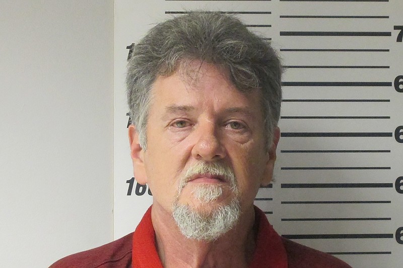 FILE -This undated photo provided by the Webster Missouri County Sheriff's Department shows Larry Dinwiddie. Dinwiddie, who pleaded guilty to&#xa0;stuffing his wife's body in a freezer&#xa0;more than six years ago has been sentenced to 25 years in prison. Dinwiddie, of Marshfield, was sentenced Monday, Jan. 24, 2021 after he pleaded guilty in November to second-degree murder in the death of Cynthia Dinwiddie (Webster County Sheriff's Department via AP)