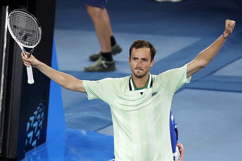 Daniil Medvedev of Russia celebrates after defeating Felix Auger-Aliassime of Canada in their quarterfinal match at the Australian Open tennis championships in Melbourne, Australia, early Thursday. – Photo by Hamish Blair of The Associated Press