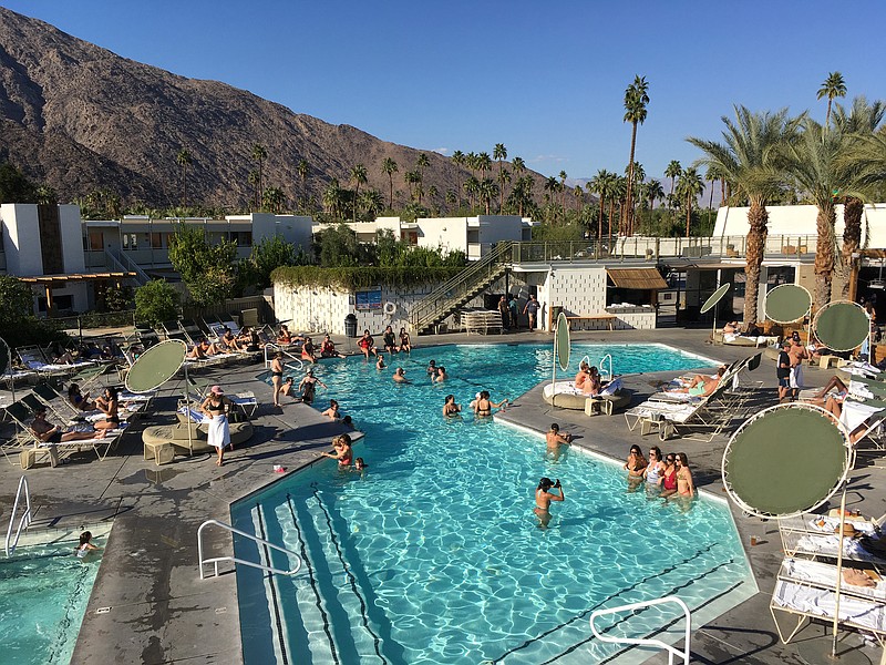 At the Ace Hotel &amp; Swim Club in Palm Springs, California, guests can practically live poolside -- order food and drinks, pad over to the gym and then the spa for a massage -- without leaving the little pleasure cage separating them from the rest of the world. (Brendan Kiley/The Seattle Times/TNS)