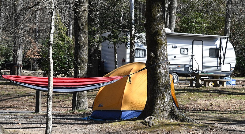 Tents and campers occupy campsites at Gulpha Gorge Campground Wednesday. Beginning Feb. 1, the sites will be reservable for the first time. - Photo by Tanner Newton of The Sentinel-Record