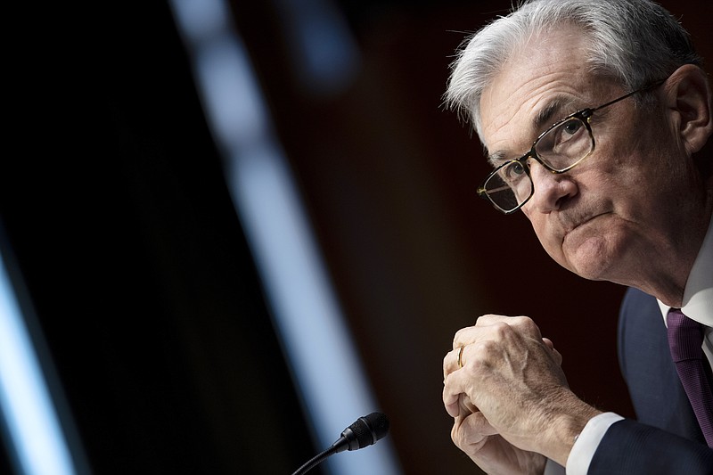 Federal Reserve Board Chairman Jerome Powell listens during his re-nominations hearing before the Senate Banking, Housing and Urban Affairs Committee, Tuesday, Jan. 11, 2022, on Capitol Hill in Washington.  (Brendan Smialowski/Pool via AP)