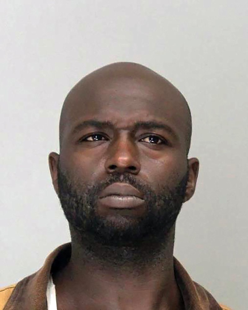 This undated booking photo provided by the Dallas County Sheriff's Office shows Henry &quot;Michael&quot; Williams. Williams, 32, was charged with being a felon in possession of a firearm after authorities say he sold the weapon that Malik Faisal Akram used when he entered Congregation Beth Israel in Colleyville, Texas, on Jan. 15 and held the synagogue's rabbi and three others hostage for hours. (Dallas County Sheriff's Office via AP)