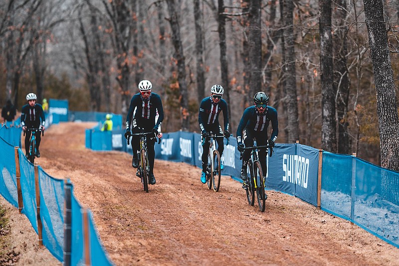 Curtis White, from left, Eric Brunner and Scott McGill of Team USA train Thursday, Jan. 27, 2022, on the UCI Cyclo-cross World Championships course at Centennial Park in Fayetteville.