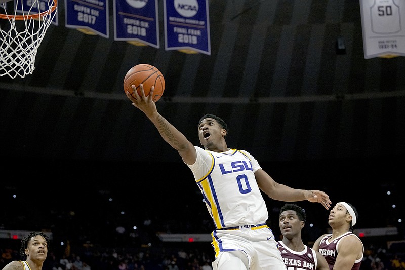 LSU guard Brandon Murray (0) shoots ahead of Texas A&amp;M forward Henry Coleman III (15) during the first half of an NCAA college basketball game in Baton Rouge, La., Wednesday, Jan. 26, 2022. (AP Photo/Matthew Hinton)