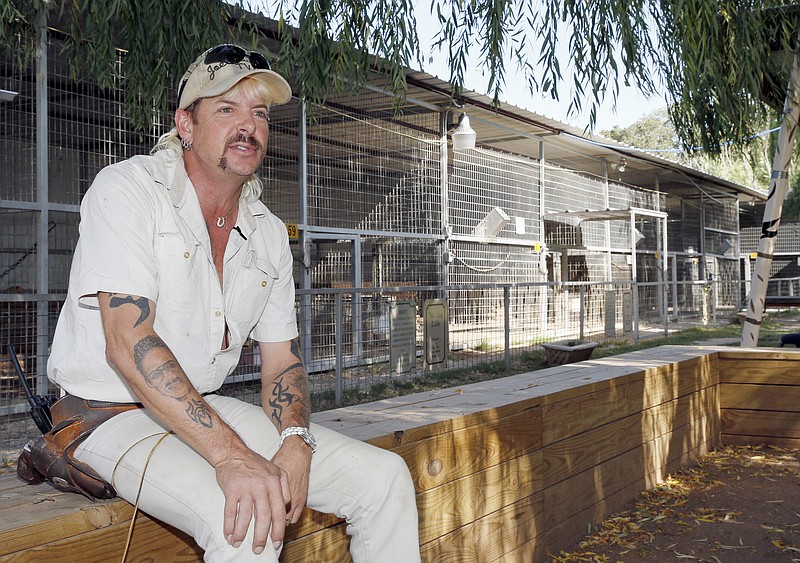 FILE - In this Aug. 28, 2013, file photo, Joseph Maldonado answers a question during an interview at the zoo he runs in Wynnewood, Okla. Maldonado known also as &#x201c;Tiger King&#x201d; Joe Exotic is headed to a federal courtroom Friday, Jan. 28, 2022, for a resentencing hearing. He's now in federal prison after a jury convicted him in a murder-for-hire plot involving his chief rival, Carole Baskin. (AP Photo/Sue Ogrocki, File)