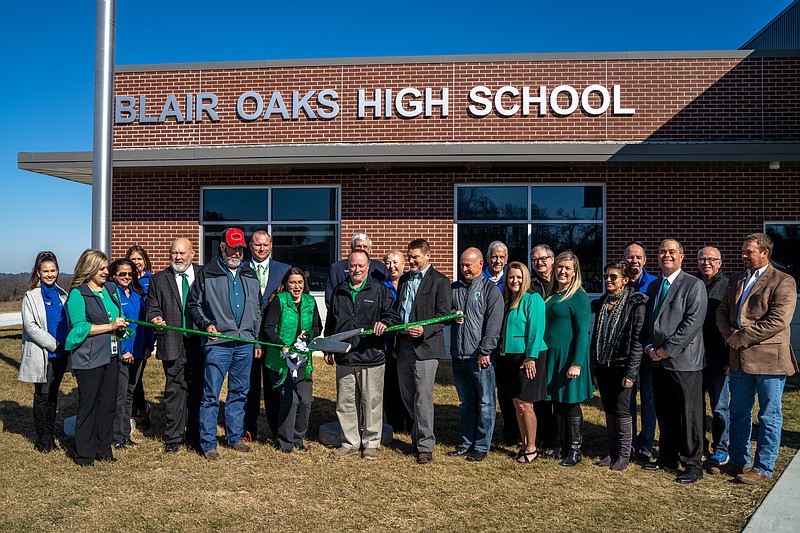 Ethan Weston/News Tribune
Members of the Blair Oaks School Board and other public officials cut the ribbon Saturday to officially dedicate the new Blair Oaks High School.