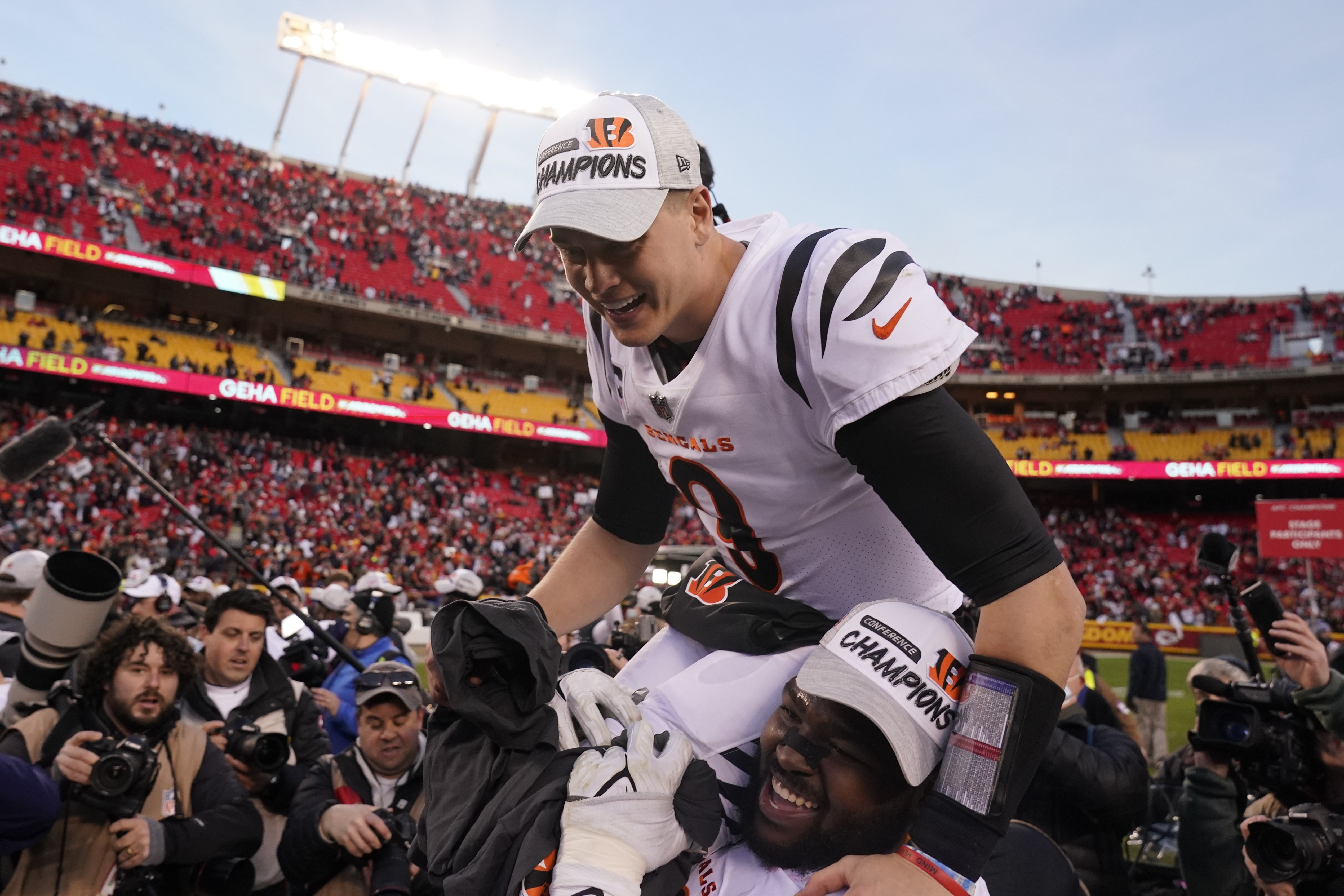 Cincinnati Bengals quarterback Joe Burrow (9) runs onto the field during  the first half of the AFC championship NFL football game against the Kansas  City Chiefs, Sunday, Jan. 30, 2022, in Kansas