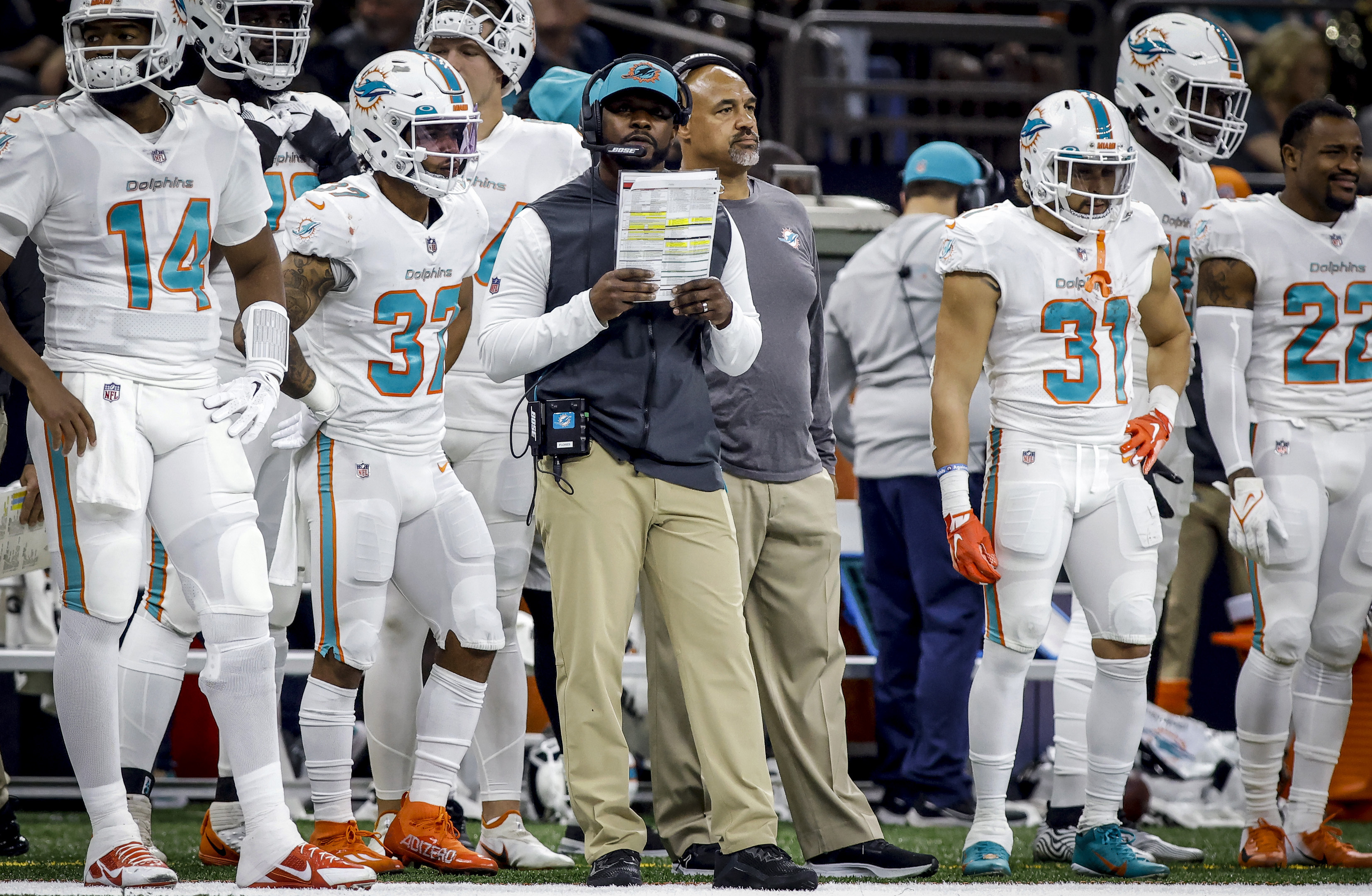 Fired Dolphins coach sues, alleges racist hiring