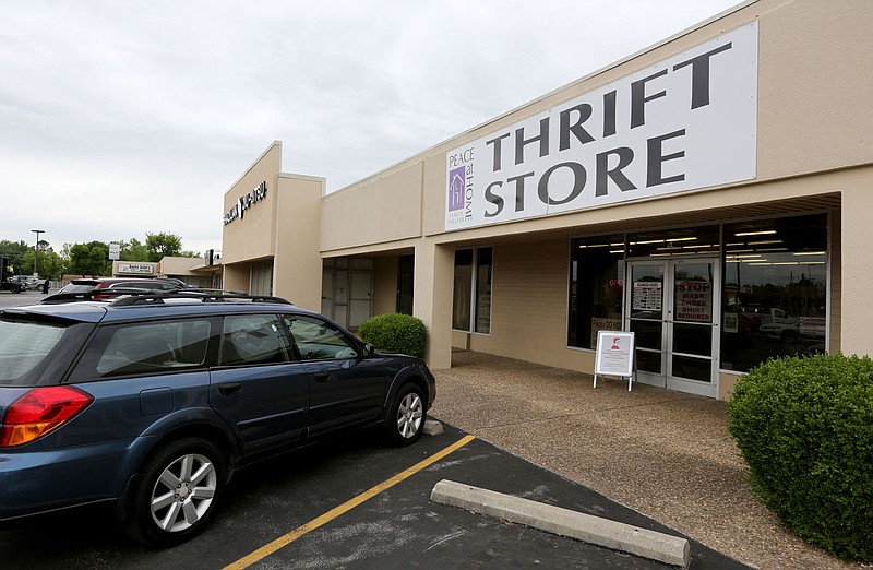 The Peace at Home Family Shelter Thrift Store is seen Friday, May 7, 2021, at 1200 Garland Ave. in Fayetteville. The nonprofit, Peace at Home Family Shelter, has plans to double the size of its emergency shelter, have more outdoor greenspace and build a pet sanctuary in memory of Candy Clark. (File photo/NWA Democrat-Gazette/David Gottschalk)