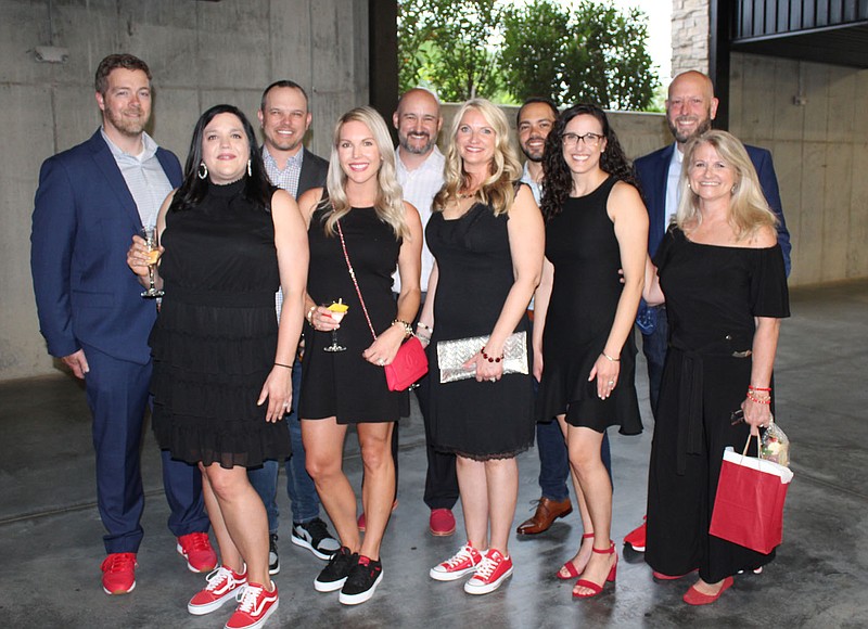 Jon and Tresa Reynolds (from left), Chris and Morgan Chandler,Tony and Kate Castagne, David and Carine Castagne and Steve and Kristi Evers attend the Red Shoe Soiree.
(NWA Democrat-Gazette/Carin Schoppmeyer)