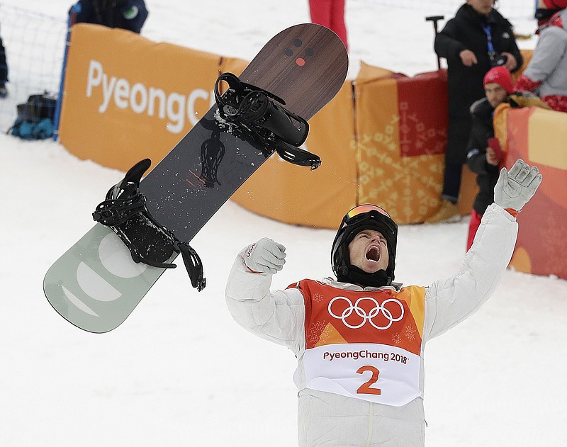 FILE - Shaun White, of the United States, celebrates winning gold after his run during the men's halfpipe finals at Phoenix Snow Park at the 2018 Winter Olympics in Pyeongchang, South Korea, Feb. 14, 2018. The Beijing Olympics will be the fifth Olympics for the three-time gold medalist. And the last Olympics for the 35-year-old &#x2014; get this &#x2014; elder-statesman who is now more than double the age of some of the riders he goes against. (AP Photo/Gregory Bull, File)